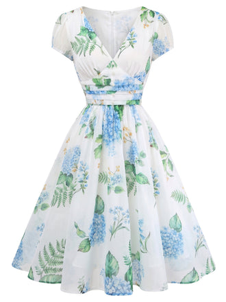 Blaues 50er Swingkleid mit Blumen-Print und V-Ausschnitt