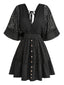Schwarzes 70er Kleid mit Spitzeneinsatz und Fledermausärmeln