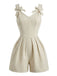 Beige 50er Romper mit Schleife und Plissee