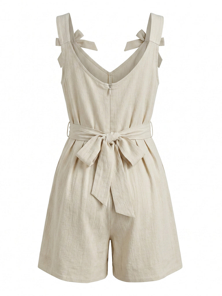 Beige 50er Romper mit Schleife und Plissee