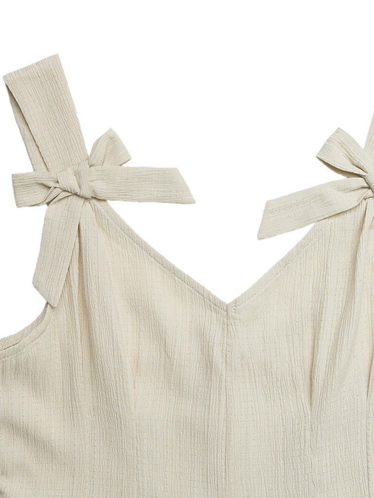 Beige 50er Romper mit Schleife und Plissee