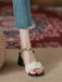 Sandalen mit High Heel und Knöchel in Schwarz & Weiß