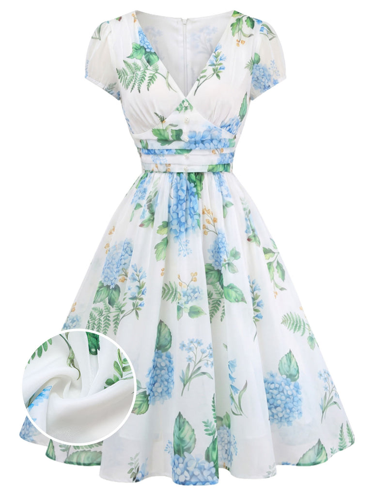 Blaues 50er Swingkleid mit Blumen-Print und V-Ausschnitt