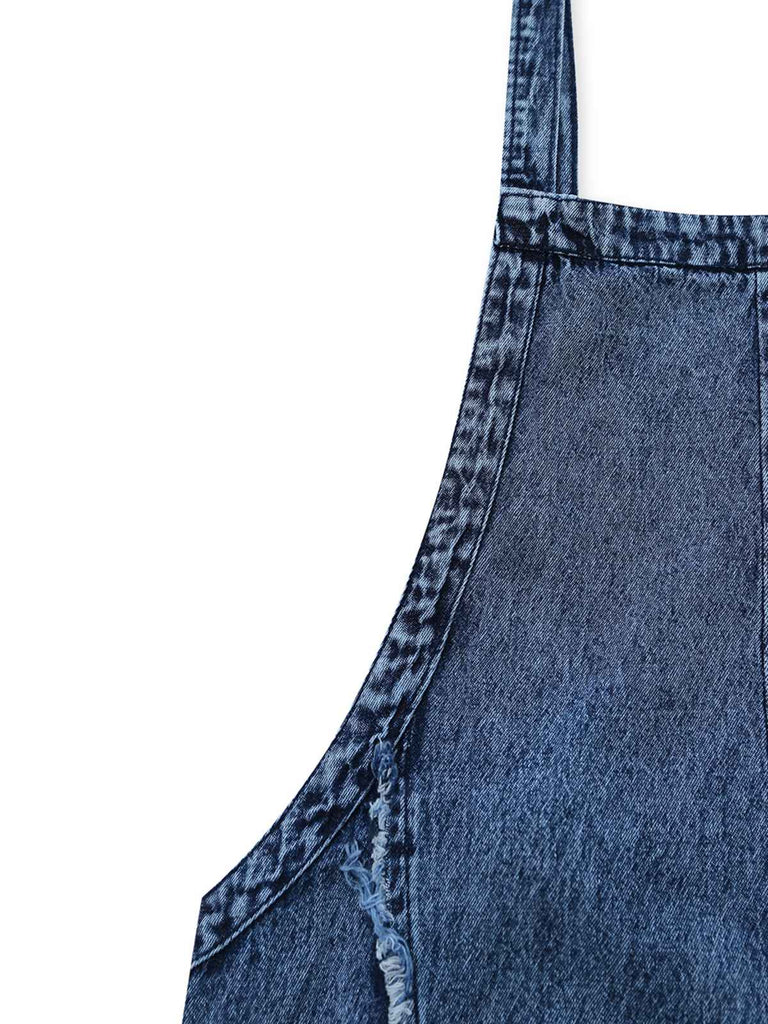 Weite, blaue Denim-Latzhose aus den 1970er-Jahren mit ausgefransten Kanten für einen klassischen, retro-inspirierten Streetwear-Look