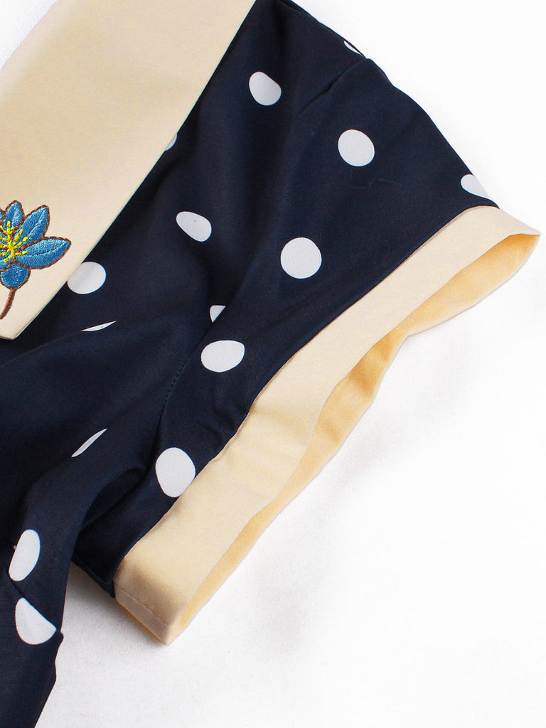 Blaues 50er Swingkleid mit Polka-Dots und Blumen