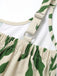 Grüner 60er Tropen Jumpsuit mit Spaghettiträger und Print