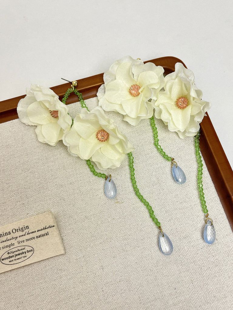 Grüne Ohrringe mit Blumen und Resin
