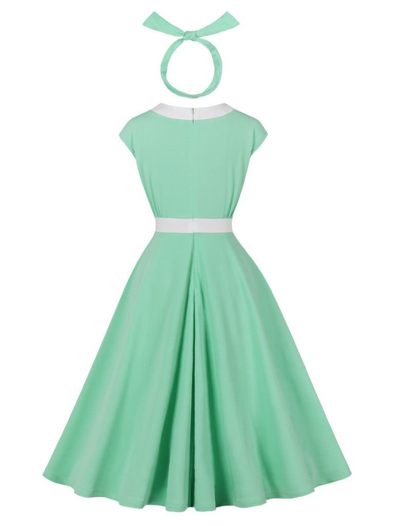 Grünes 50er Swingkleid mit Kappärmel und Schleife