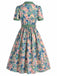 Hellblaues 50er Kleid mit Blumen und Kerbe