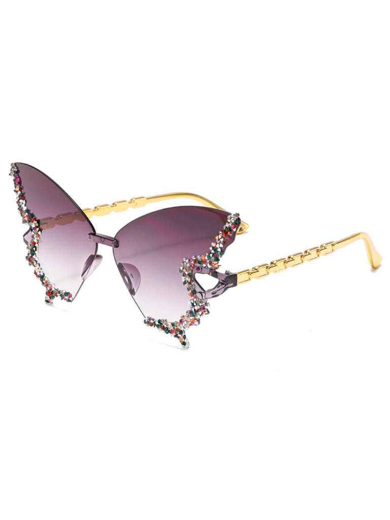 Sonnenbrille mit floralen Verzierungen auf weißem Hintergrund