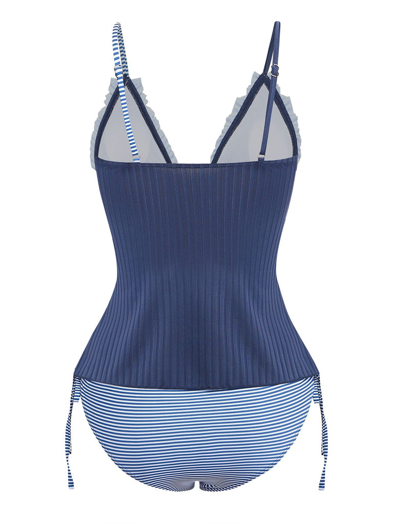 Marineblau gestreifter Tankini mit Rüschenoberteil zum Binden vorne im Vintage-Bademodenstil der 1950er Jahre.