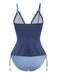 Marineblau gestreifter Tankini mit Rüschenoberteil zum Binden vorne im Vintage-Bademodenstil der 1950er Jahre.