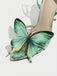 Grüne Sandalen mit Knöchelriemen und Schmetterling