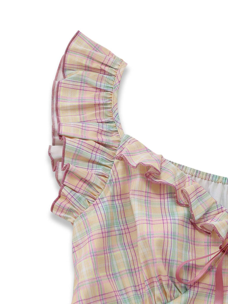 Pastellfarbenes Karokleid im Swing-Stil mit Rüschenschleife und herzförmigem Ausschnitt für einen Vintage-Look der 1950er Jahre