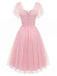 Rosa 50er Netzkleid mit Herzausschnitt und Polka-Dots
