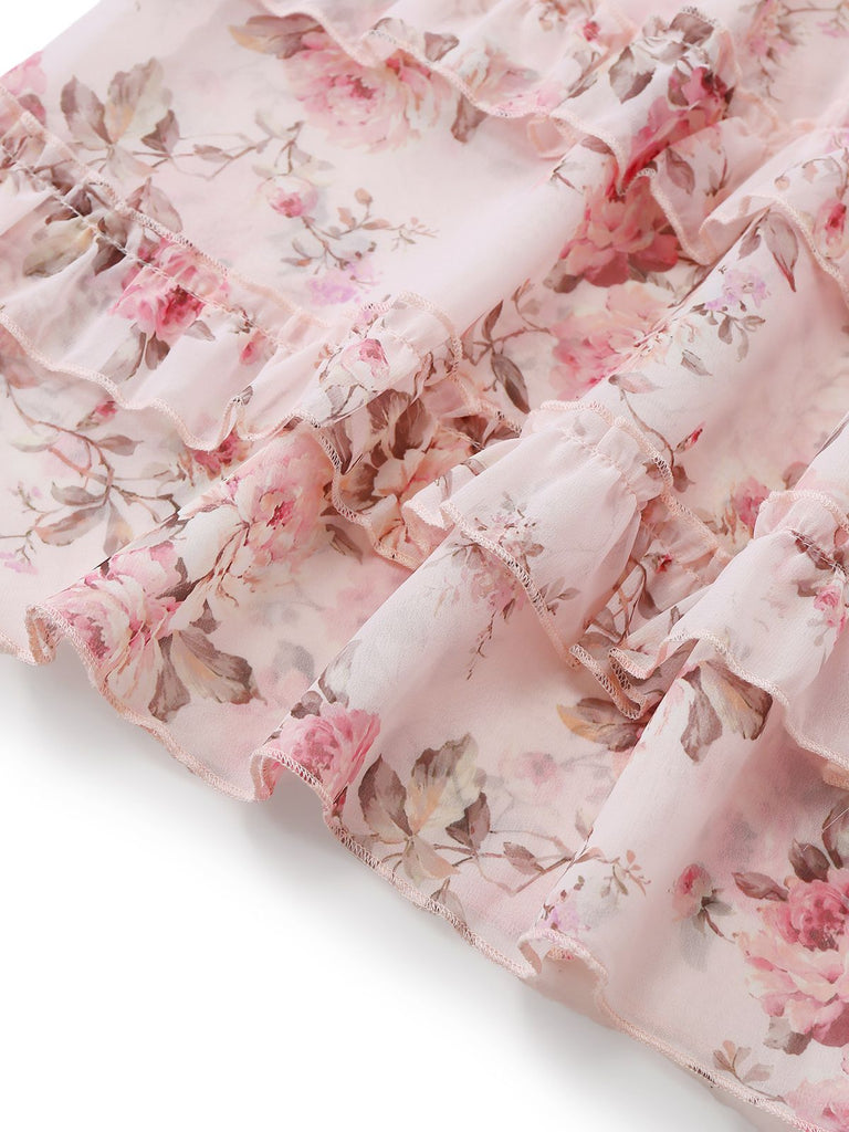 Geblümter Stoff mit rosa und weißen Blüten auf hellem Hintergrund