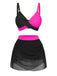 Schwarzer und pinkfarbener zweiteiliger Badeanzug mit Rock auf weißem Hintergrund
