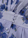 Blaues 50er Kleid mit Puffärmel und V-Ausschnitt