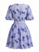 Blaues 50er Kleid mit Blumen und Puffärmeln