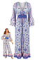 Blauer 70er Boho-Jumpsuit mit Streublumen und Trompetenärmeln