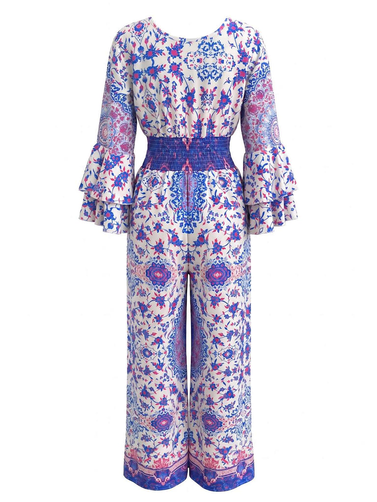 Blauer 70er Boho-Jumpsuit mit Streublumen und Trompetenärmeln