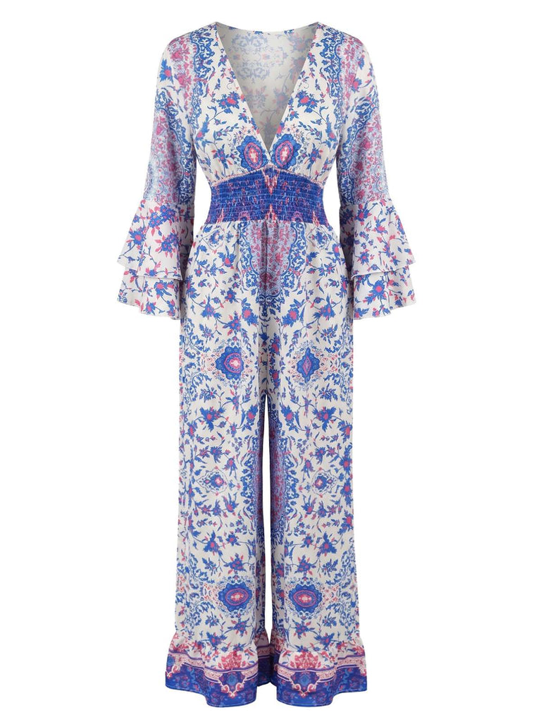 Blauer 70er Boho-Jumpsuit mit Streublumen und Trompetenärmeln