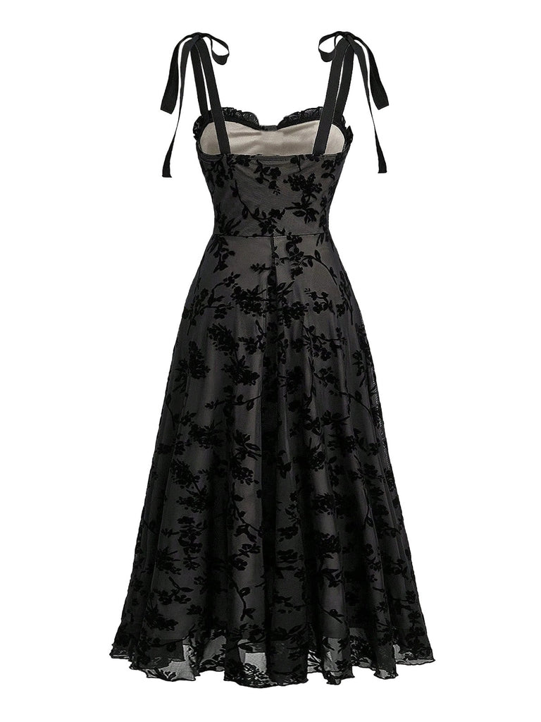 Schwarzes 50er Midikleid mit Blumen und Samt