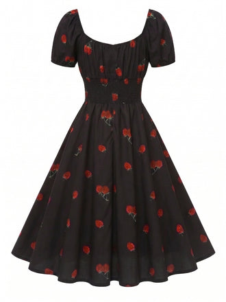 [Vorverkauf] Schwarzes 50er Midikleid mit Himbeer-Print und Neckholder