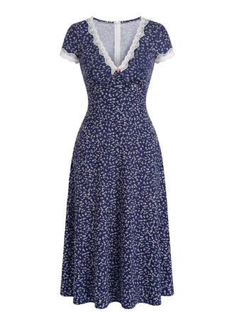 Dunkelblaues 40er Kleid mit V-Ausschnitt und Blumen