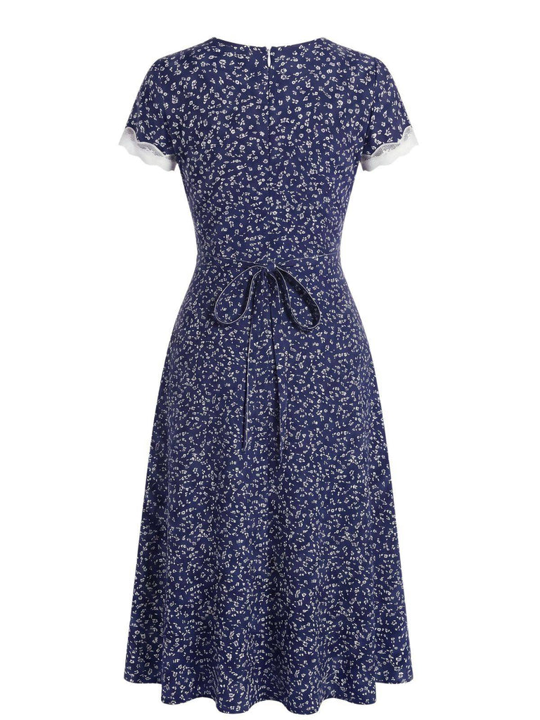 Dunkelblaues 40er Kleid mit V-Ausschnitt und Blumen