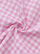 Rosa 50er Kleid mit Gingham und Puffärmeln