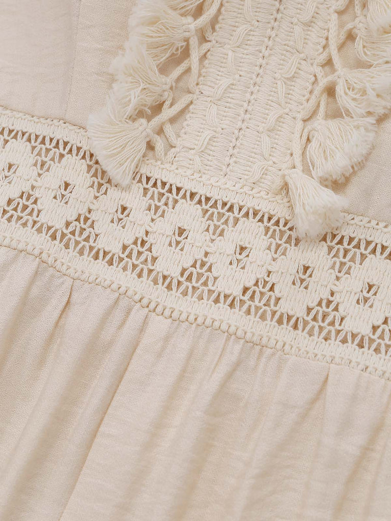 Beiger 70er Jumpsuit mit Häkelspitze und Fransenbesatz