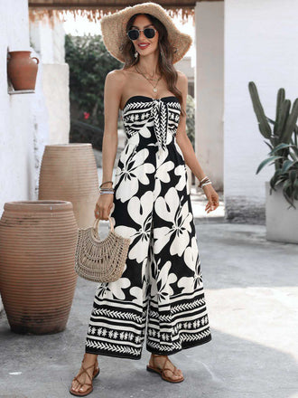 Schwarzer 70er Trägerloser Jumpsuit mit Blumen und Vorderbindung