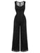 Schwarzer 60er Jumpsuit mit Herzausschnitt und Pailletten