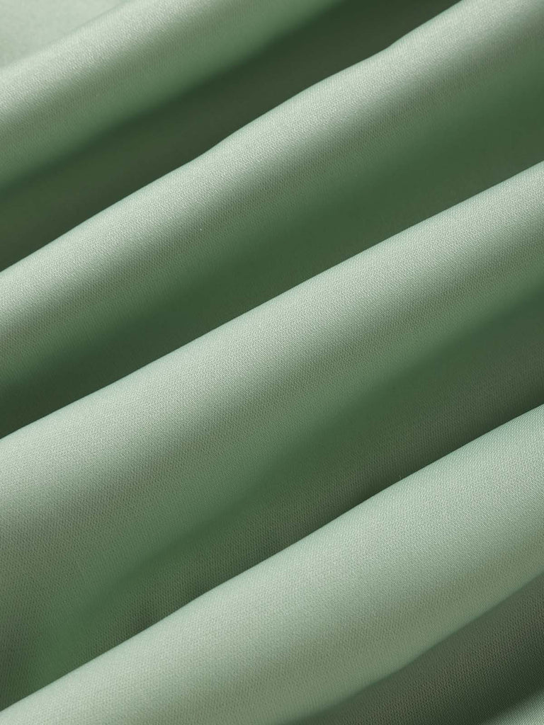 Grünes 60er Bleistiftkleid mit Schleife und Farbblock