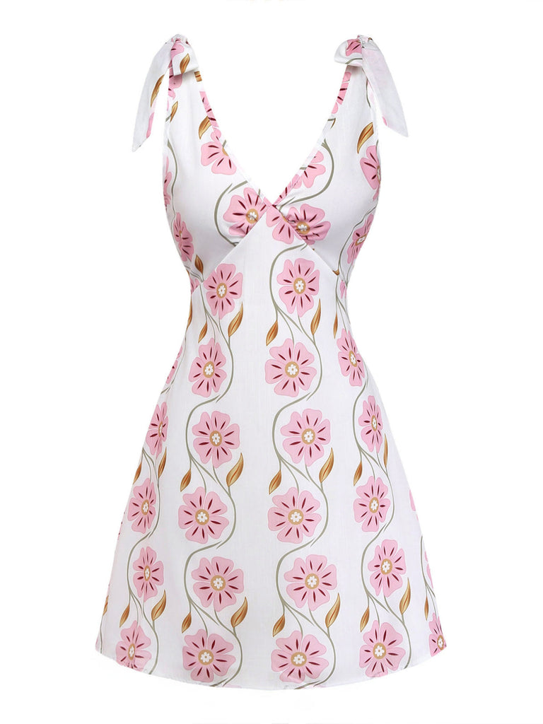 Rosa 60er Kleid mit Spaghettiträger und Blumen