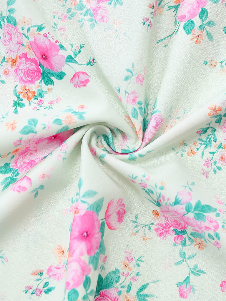 Grünes 50er Kleid mit Streublumen und Puffärmel