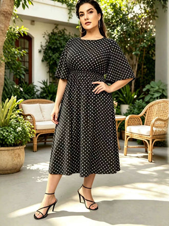 [Übergröße] Schwarzes 60er Midikleid mit Polka-Dots und Runden