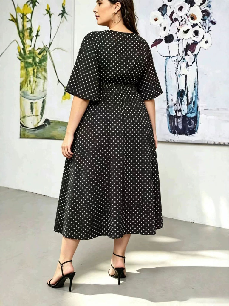 [Übergröße] Schwarzes 60er Midikleid mit Polka-Dots und Runden