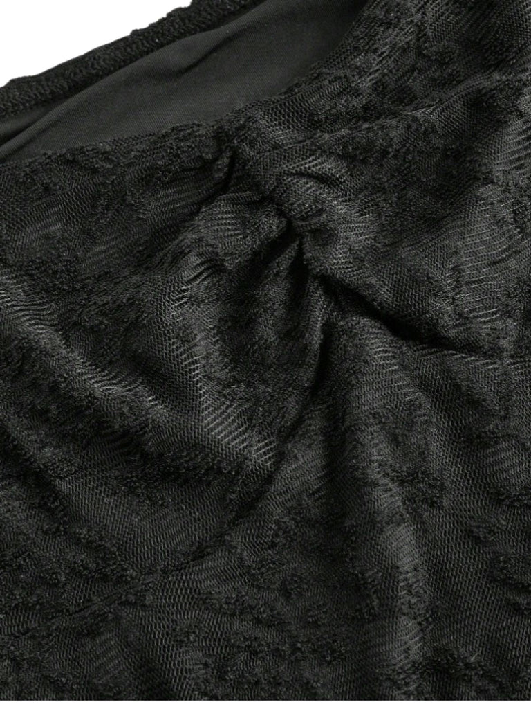 Schwarzes 50er Kleid mit Neckholder und Spitze