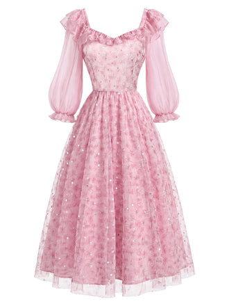 Rosa 50er Netzkleid mit Rüschen und Blumen
