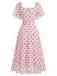 Rosa 40er Midikleid mit Puffärmel und Polka-Dots