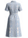 Blaues 40er Kleid mit Pflanzenprint und Schlitz