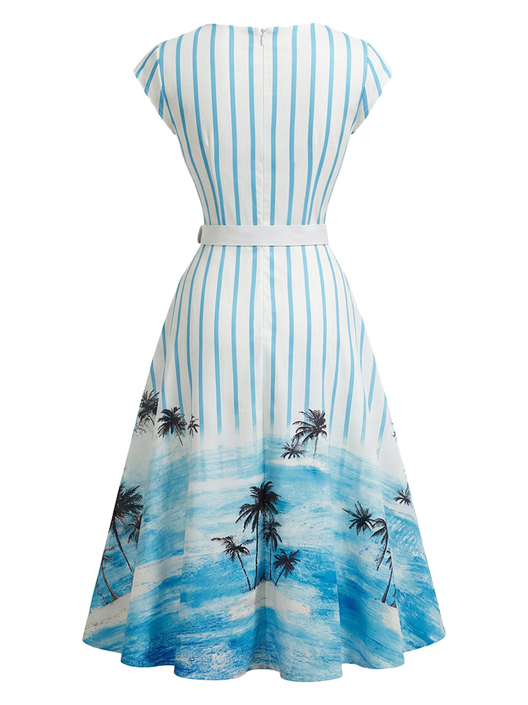 Blaues 50er Swingkleid mit Print und Palmen