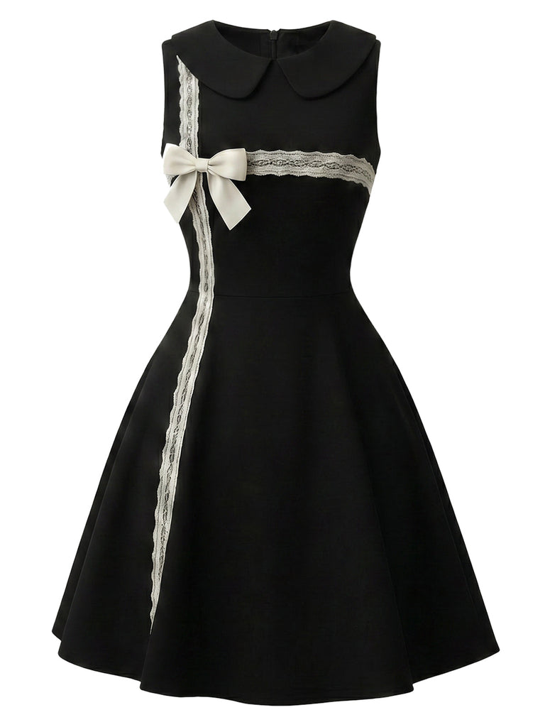Schwarzes 50er Kleid mit apricotfarbenem Spitzenbesatz und Schleife