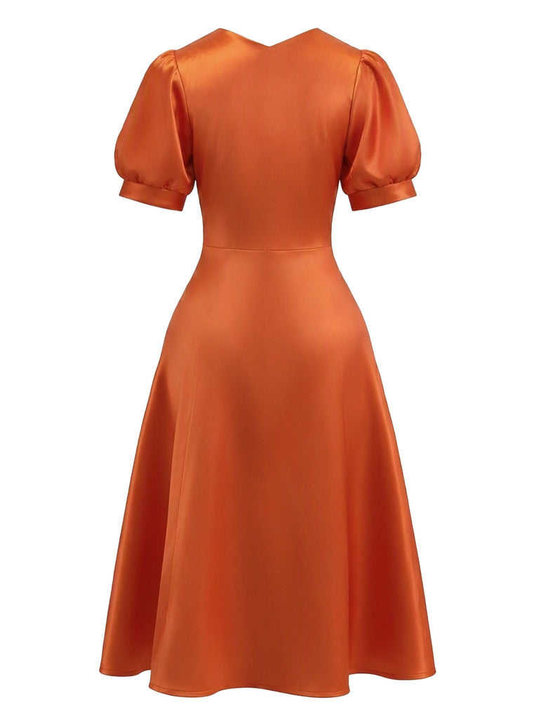 Oranges 50er Halloween-Kleid mit Puffärmeln