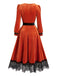 Orange 50er Samtkleid mit tiefem V-Ausschnitt und Spitzenbesatz