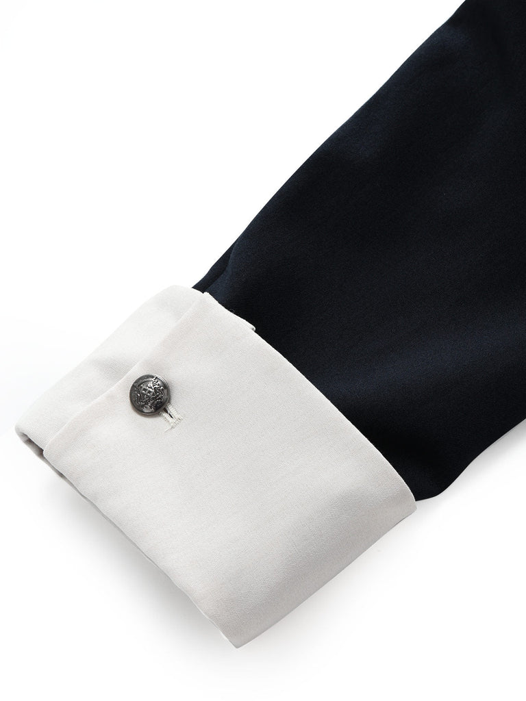 Dunkelblauer 60er Blazer mit Kontrastrevers und Gürtel