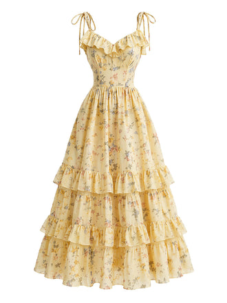 Gelbes 50er Kleid mit Blumen und Rüschen