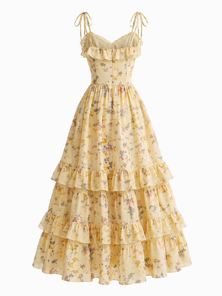 Gelbes 50er Kleid mit Blumen und Rüschen